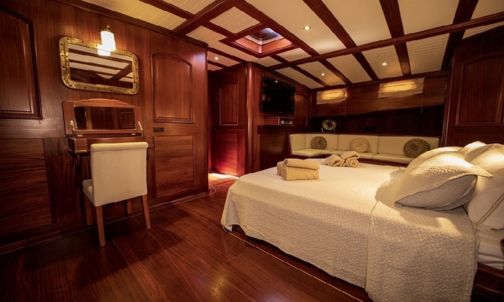 Book a 36m luxury gulet with 6 cabins and crew. Enjoy private cruises from Bodrum to Fethiye, including water activities and gourmet dining.