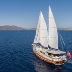 Charter the 34m Kaptan Mehmet Buğra Gulet in Turkey. 8 cabins for 18 guests, Jacuzzi on deck, professional crew, and premium Blue Cruise along Marmaris, Bodrum, Göcek & Aegean coasts.
