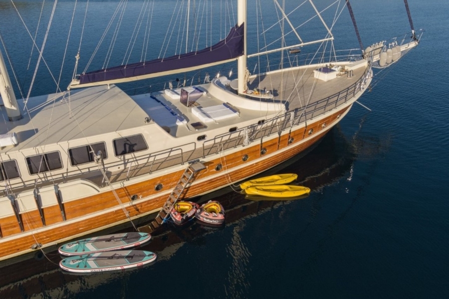 Charter the 34m Kaptan Mehmet Buğra Gulet in Turkey. 8 cabins for 18 guests, Jacuzzi on deck, professional crew, and premium Blue Cruise along Marmaris, Bodrum, Göcek & Aegean coasts.