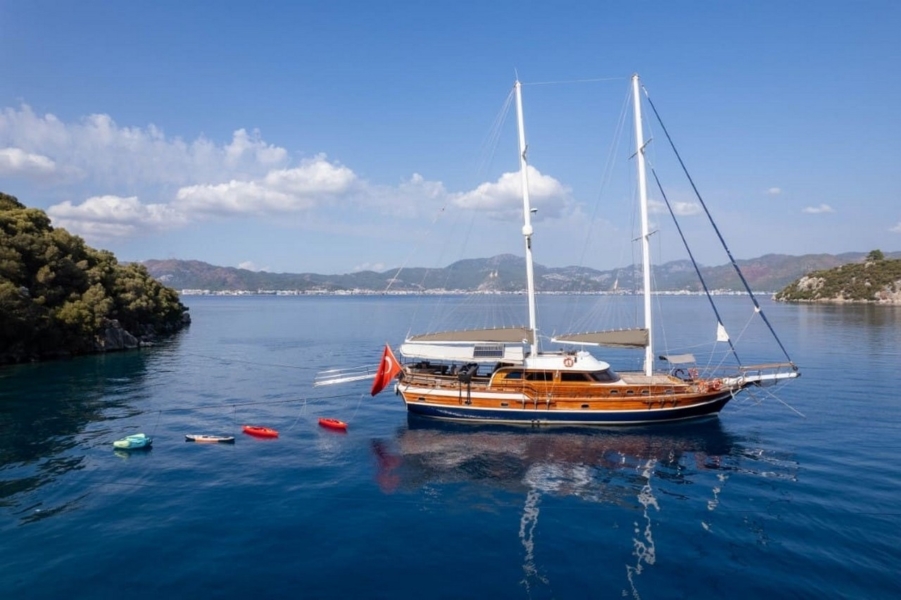 Luxury 24m gulet with 5 cabins for up to 10 guests. Explore Marmaris, Bodrum, Göcek with private crew and full water sports amenities.