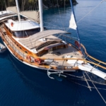 Luxury 24m gulet with 5 cabins for up to 10 guests. Explore Marmaris, Bodrum, Göcek with private crew and full water sports amenities.
