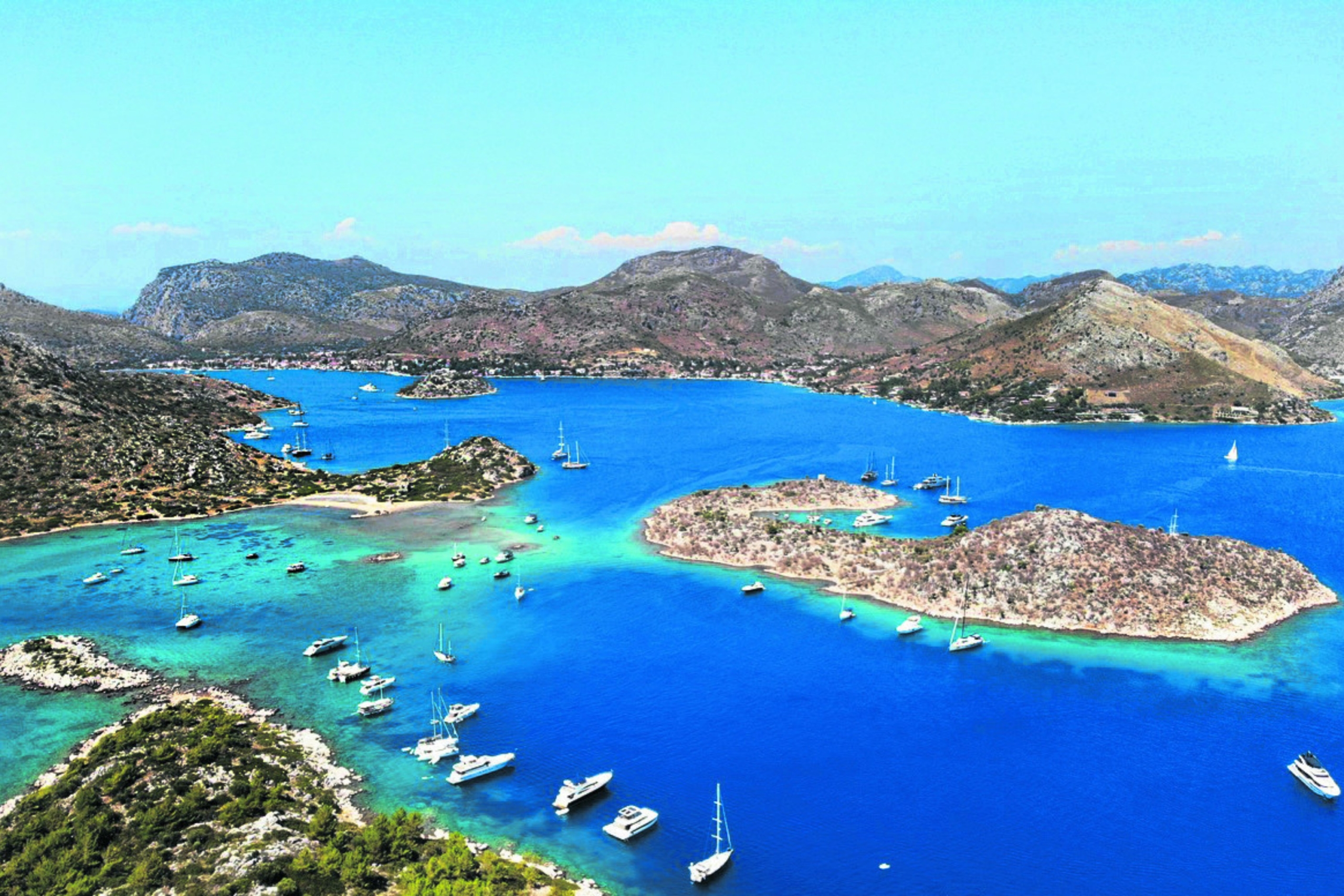 Set sail from Fethiye and explore Ölüdeniz, Butterfly Valley, Gemiler Island & secret coves on a dream Blue Cruise adventure.