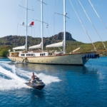 Experience an unforgettable blue cruise aboard YAZZ yacht in Turkey & Greek Islands. 5 cabins, 11 guests, water sports, private routes, ultimate luxury