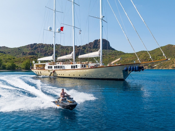 Experience an unforgettable blue cruise aboard YAZZ yacht in Turkey & Greek Islands. 5 cabins, 11 guests, water sports, private routes, ultimate luxury