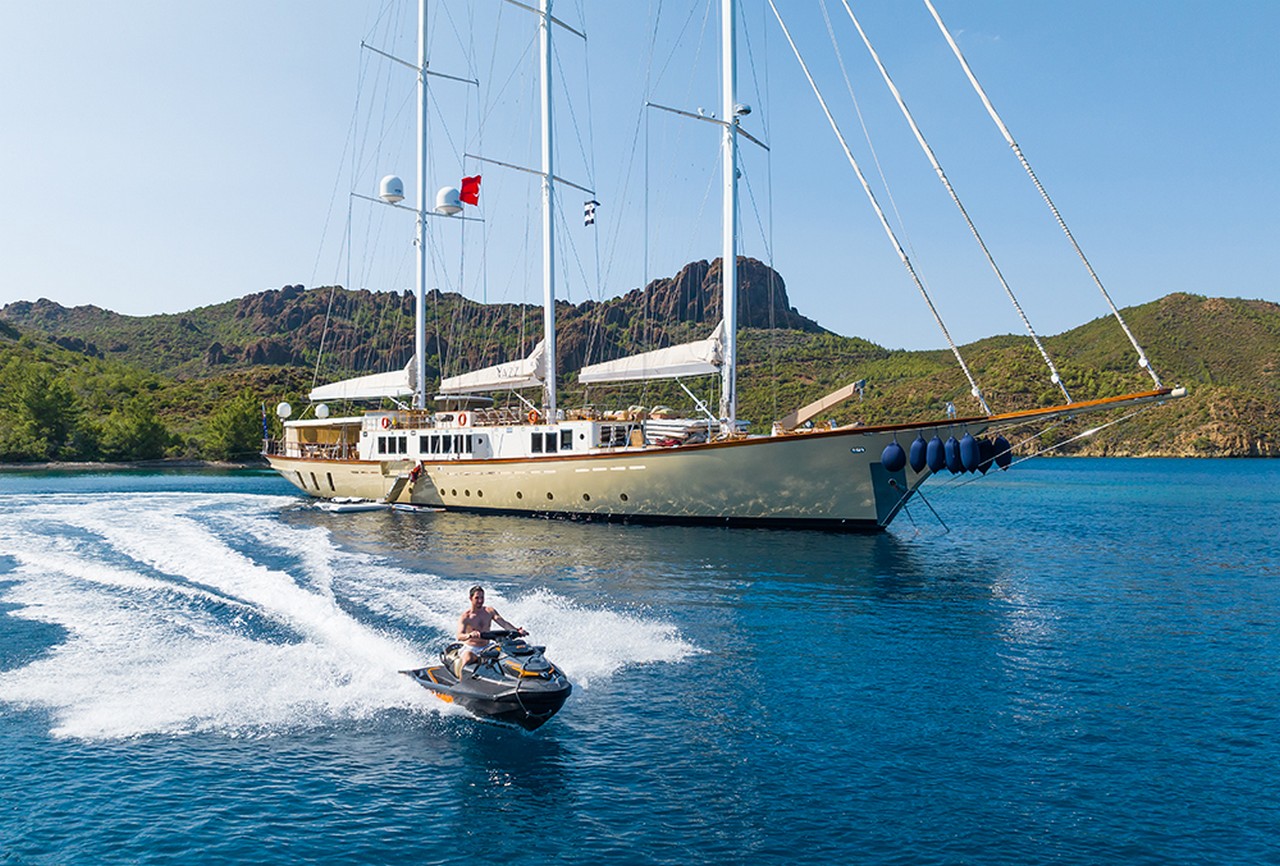 Experience an unforgettable blue cruise aboard YAZZ yacht in Turkey & Greek Islands. 5 cabins, 11 guests, water sports, private routes, ultimate luxury