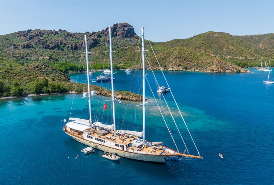 Experience an unforgettable blue cruise aboard YAZZ yacht in Turkey & Greek Islands. 5 cabins, 11 guests, water sports, private routes, ultimate luxury